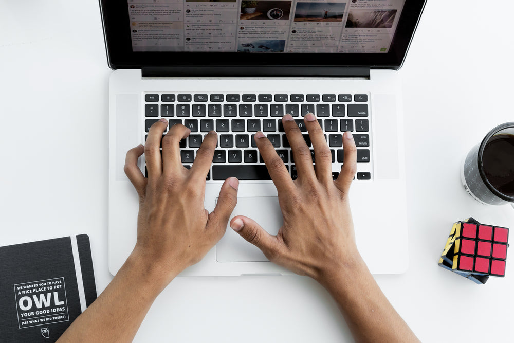 making-a-social-media-post-on-laptop